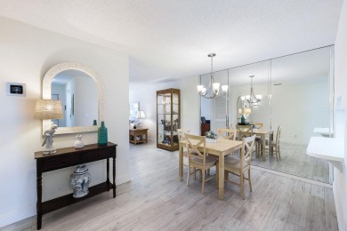 Looking for a lovely, updated condominium with a Structure on Hibiscus Golf Club in Florida - for sale on GolfHomes.com, golf home, golf lot