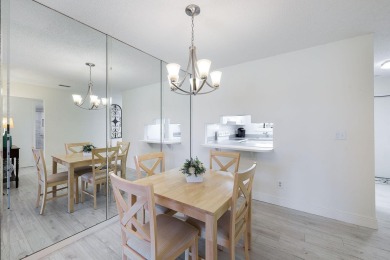 Looking for a lovely, updated condominium with a Structure on Hibiscus Golf Club in Florida - for sale on GolfHomes.com, golf home, golf lot