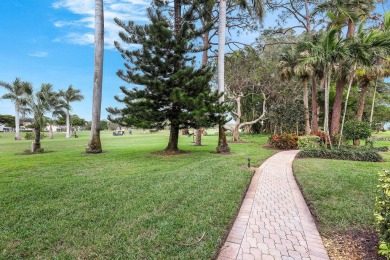 Looking for a lovely, updated condominium with a Structure on Hibiscus Golf Club in Florida - for sale on GolfHomes.com, golf home, golf lot