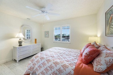 Looking for a lovely, updated condominium with a Structure on Hibiscus Golf Club in Florida - for sale on GolfHomes.com, golf home, golf lot
