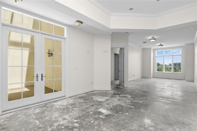 Discover luxury living in this exquisite two-story condominium on Winter Park Country Club in Florida - for sale on GolfHomes.com, golf home, golf lot