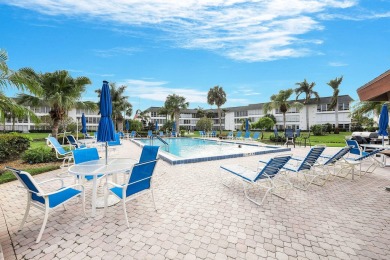 Looking for a lovely, updated condominium with a Structure on Hibiscus Golf Club in Florida - for sale on GolfHomes.com, golf home, golf lot