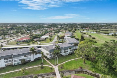Looking for a lovely, updated condominium with a Structure on Hibiscus Golf Club in Florida - for sale on GolfHomes.com, golf home, golf lot