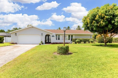 Your home search ends here in the highly desirable Palm Beach on Palm Beach National Golf and Country Club in Florida - for sale on GolfHomes.com, golf home, golf lot