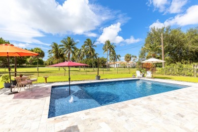 Your home search ends here in the highly desirable Palm Beach on Palm Beach National Golf and Country Club in Florida - for sale on GolfHomes.com, golf home, golf lot
