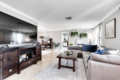 Your home search ends here in the highly desirable Palm Beach on Palm Beach National Golf and Country Club in Florida - for sale on GolfHomes.com, golf home, golf lot