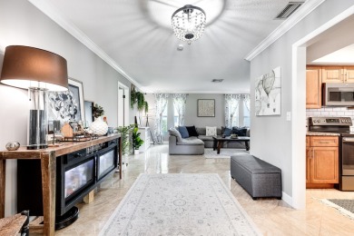 Your home search ends here in the highly desirable Palm Beach on Palm Beach National Golf and Country Club in Florida - for sale on GolfHomes.com, golf home, golf lot