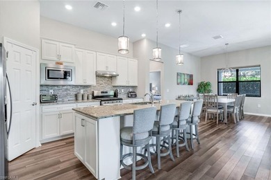 Luxurious Living in Greyhawk at Golf Club of the Everglades on Calusa Pines Golf Club in Florida - for sale on GolfHomes.com, golf home, golf lot