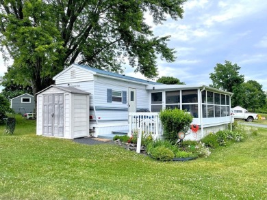 Enjoy summer in Vermont with a cottage at Apple Island Resort on on Apple Island Golf Course At Apple Island Resort in Vermont - for sale on GolfHomes.com, golf home, golf lot