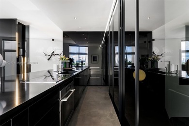 This incredible pristine custom 2-bedroom, 2 bath residence on Miami Beach Golf Club in Florida - for sale on GolfHomes.com, golf home, golf lot
