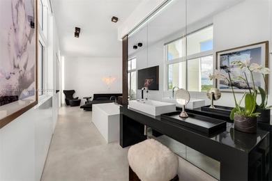 This incredible pristine custom 2-bedroom, 2 bath residence on Miami Beach Golf Club in Florida - for sale on GolfHomes.com, golf home, golf lot
