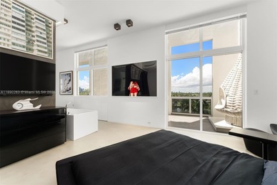 This incredible pristine custom 2-bedroom, 2 bath residence on Miami Beach Golf Club in Florida - for sale on GolfHomes.com, golf home, golf lot
