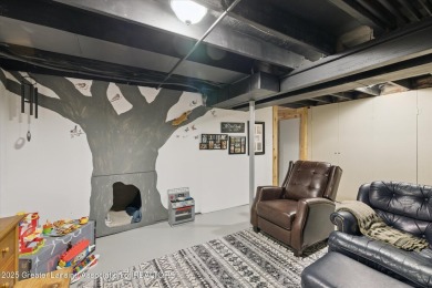 Take a look at this updated 3 bed 1 1/2 bath end unit condo in on Lake O The Hills Golf Course in Michigan - for sale on GolfHomes.com, golf home, golf lot