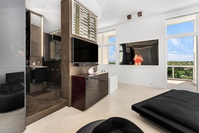 This incredible pristine custom 2-bedroom, 2 bath residence on Miami Beach Golf Club in Florida - for sale on GolfHomes.com, golf home, golf lot