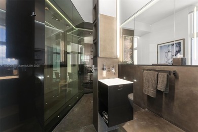 This incredible pristine custom 2-bedroom, 2 bath residence on Miami Beach Golf Club in Florida - for sale on GolfHomes.com, golf home, golf lot