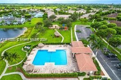 Fabulous townhouse with a garage in the beautiful Guard Gated on Keys Gate Golf Club in Florida - for sale on GolfHomes.com, golf home, golf lot