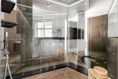 This incredible pristine custom 2-bedroom, 2 bath residence on Miami Beach Golf Club in Florida - for sale on GolfHomes.com, golf home, golf lot