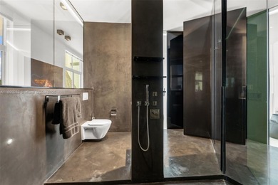 This incredible pristine custom 2-bedroom, 2 bath residence on Miami Beach Golf Club in Florida - for sale on GolfHomes.com, golf home, golf lot