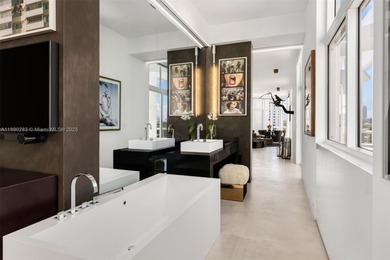 This incredible pristine custom 2-bedroom, 2 bath residence on Miami Beach Golf Club in Florida - for sale on GolfHomes.com, golf home, golf lot