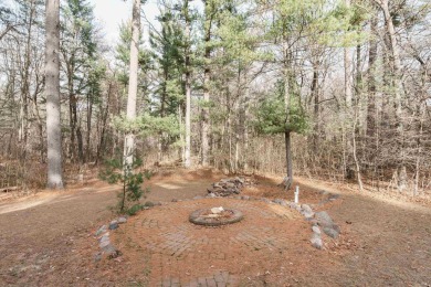 Beautiful Northwoods lake house in the heart of a recreation on Sand Valley Golf Course in Wisconsin - for sale on GolfHomes.com, golf home, golf lot