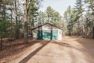 Beautiful Northwoods lake house in the heart of a recreation on Sand Valley Golf Course in Wisconsin - for sale on GolfHomes.com, golf home, golf lot