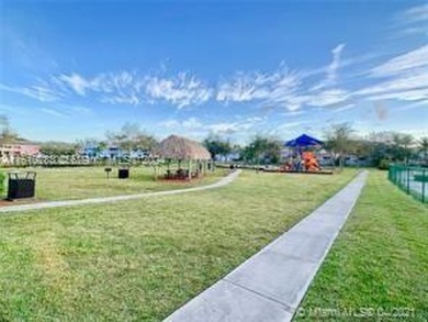 Fabulous townhouse with a garage in the beautiful Guard Gated on Keys Gate Golf Club in Florida - for sale on GolfHomes.com, golf home, golf lot