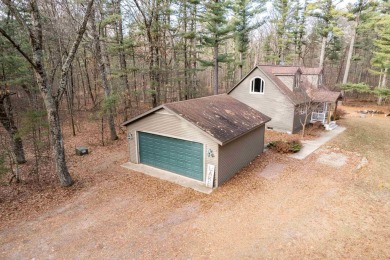 Beautiful Northwoods lake house in the heart of a recreation on Sand Valley Golf Course in Wisconsin - for sale on GolfHomes.com, golf home, golf lot