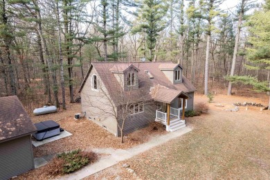 Beautiful Northwoods lake house in the heart of a recreation on Sand Valley Golf Course in Wisconsin - for sale on GolfHomes.com, golf home, golf lot