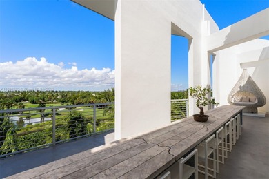 This incredible pristine custom 2-bedroom, 2 bath residence on Miami Beach Golf Club in Florida - for sale on GolfHomes.com, golf home, golf lot