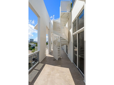 This incredible pristine custom 2-bedroom, 2 bath residence on Miami Beach Golf Club in Florida - for sale on GolfHomes.com, golf home, golf lot