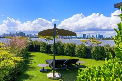 This incredible pristine custom 2-bedroom, 2 bath residence on Miami Beach Golf Club in Florida - for sale on GolfHomes.com, golf home, golf lot