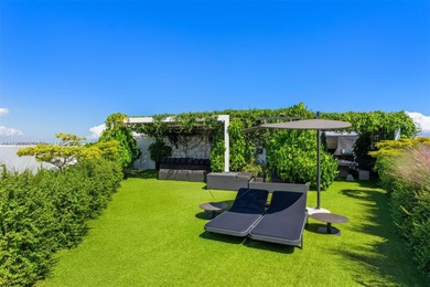This incredible pristine custom 2-bedroom, 2 bath residence on Miami Beach Golf Club in Florida - for sale on GolfHomes.com, golf home, golf lot