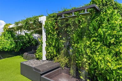 This incredible pristine custom 2-bedroom, 2 bath residence on Miami Beach Golf Club in Florida - for sale on GolfHomes.com, golf home, golf lot