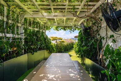 This incredible pristine custom 2-bedroom, 2 bath residence on Miami Beach Golf Club in Florida - for sale on GolfHomes.com, golf home, golf lot