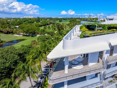 This incredible pristine custom 2-bedroom, 2 bath residence on Miami Beach Golf Club in Florida - for sale on GolfHomes.com, golf home, golf lot