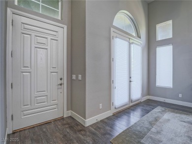 Distinguished 3-story brownstone-style townhome on a premium on Reflection Bay Golf Club in Nevada - for sale on GolfHomes.com, golf home, golf lot