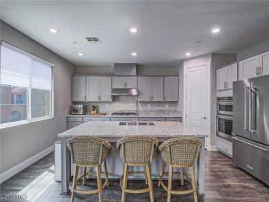 Distinguished 3-story brownstone-style townhome on a premium on Reflection Bay Golf Club in Nevada - for sale on GolfHomes.com, golf home, golf lot