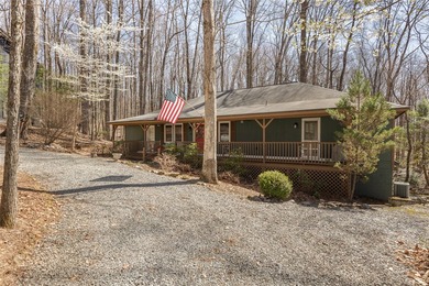 Experience the ease of relaxed mountain living in this inviting on Sapphire National Golf Club in North Carolina - for sale on GolfHomes.com, golf home, golf lot
