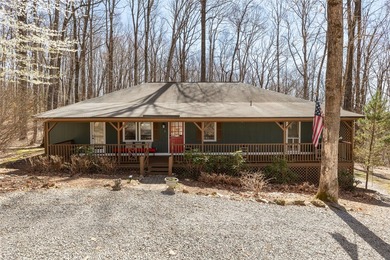 Experience the ease of relaxed mountain living in this inviting on Sapphire National Golf Club in North Carolina - for sale on GolfHomes.com, golf home, golf lot