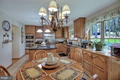 Tucked on a beautiful wooded 0.68 acre lot is this charming on Alpine Lake Resort in West Virginia - for sale on GolfHomes.com, golf home, golf lot