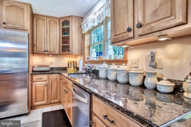 Tucked on a beautiful wooded 0.68 acre lot is this charming on Alpine Lake Resort in West Virginia - for sale on GolfHomes.com, golf home, golf lot
