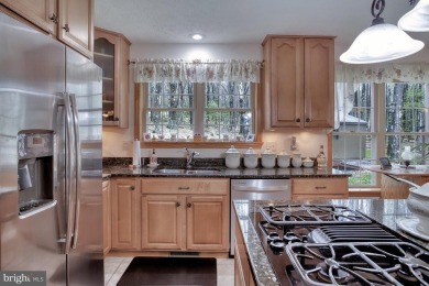 Tucked on a beautiful wooded 0.68 acre lot is this charming on Alpine Lake Resort in West Virginia - for sale on GolfHomes.com, golf home, golf lot