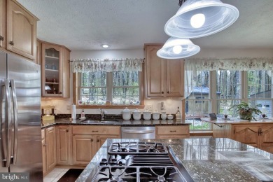 Tucked on a beautiful wooded 0.68 acre lot is this charming on Alpine Lake Resort in West Virginia - for sale on GolfHomes.com, golf home, golf lot