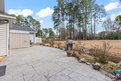 Discover coastal living at its best in the highly sought-after on Heron Point Golf Club in South Carolina - for sale on GolfHomes.com, golf home, golf lot