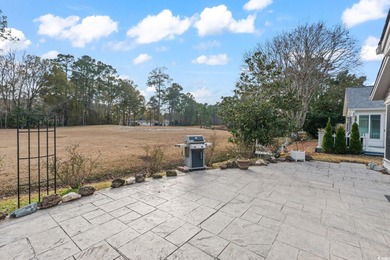 Discover coastal living at its best in the highly sought-after on Heron Point Golf Club in South Carolina - for sale on GolfHomes.com, golf home, golf lot