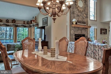 Tucked on a beautiful wooded 0.68 acre lot is this charming on Alpine Lake Resort in West Virginia - for sale on GolfHomes.com, golf home, golf lot