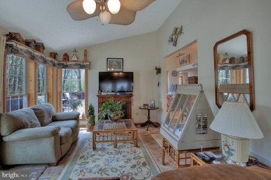 Tucked on a beautiful wooded 0.68 acre lot is this charming on Alpine Lake Resort in West Virginia - for sale on GolfHomes.com, golf home, golf lot