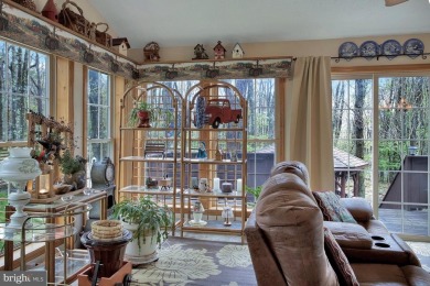 Tucked on a beautiful wooded 0.68 acre lot is this charming on Alpine Lake Resort in West Virginia - for sale on GolfHomes.com, golf home, golf lot