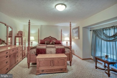 Tucked on a beautiful wooded 0.68 acre lot is this charming on Alpine Lake Resort in West Virginia - for sale on GolfHomes.com, golf home, golf lot