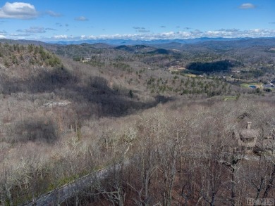 This lot offers a beautiful setting with expansive mountain on Old Edwards Club in North Carolina - for sale on GolfHomes.com, golf home, golf lot